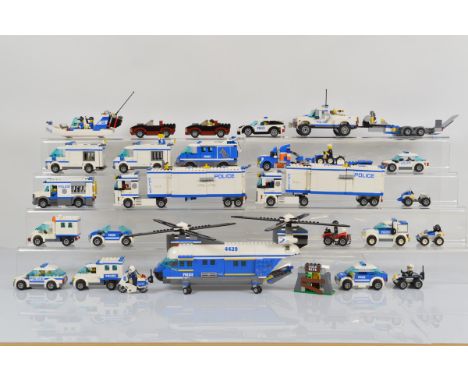 A collection of unboxed and unchecked Lego City, including two x Mobile Police Unit 60044 with full manuals, Police Patrol 60