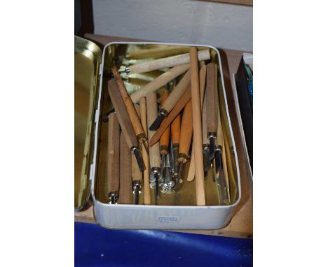 Box of various small tools for pewter and leather work