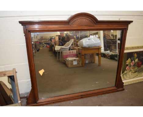 A late Victorian over mantel mirror with carved frame