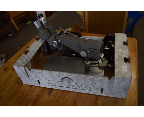 A Yashima binocular microscope together with a further binocular microscope with electric hook up and a monocular microscope 
