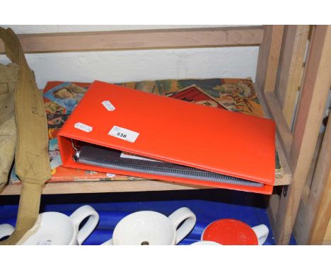 A scrap book together with an album of first day covers