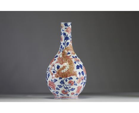 China - Polychrome porcelain vase decorated with a dragon, a phoenix and copper-red peony flowers on blue foliage, Qianlong p