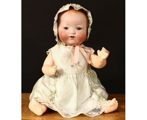 An Armand &amp; Marseille (Germany) bisque head and composition bodied Dream baby doll, weighted sleeping blue glass eyes, op