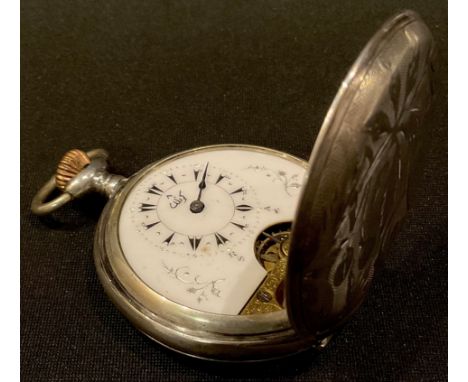 A French style silver hunter pocket watch, the case engraved with foliate blossom, vacant shield shaped cartouche, the white 