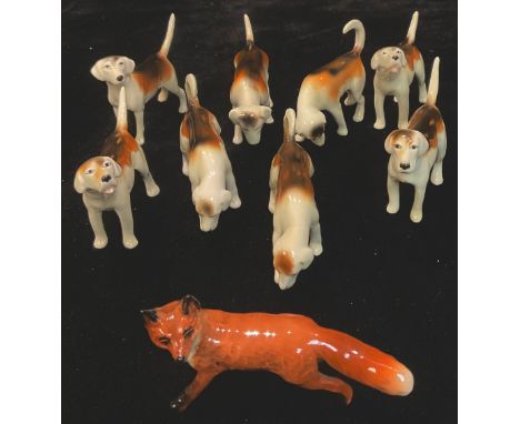 A Beswick part hunting set, comprising eight foxhounds and a fox, printed marks (9) 