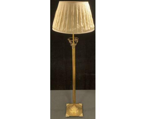 An early 20th century brass Corinthian column floor lamp 