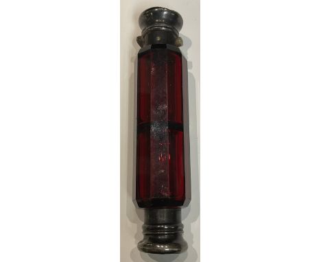 A Victorian ruby glass double ended scent bottle, silver coloured metal tops, 12.5cm long 