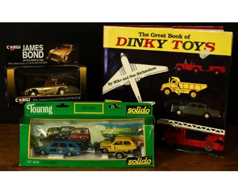 Corgi 96445 James Bond Aston Martin DB5, 30th Anniversary of Goldfinger model, gold body with red interior, seated plastic dr