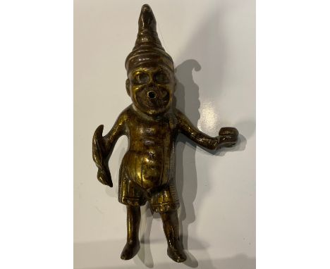 A Victorian lacquered brass bar top cigar lighter, modelled as Mr Punch, 12.5cm high 
