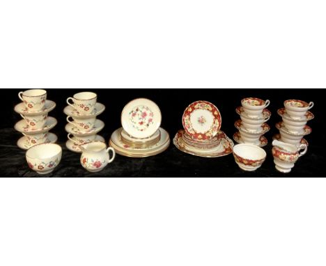 A Royal Worcester Astley pattern tea service for six comprising cake plates, side plates, cream jug, sugar bowl, cups and sau