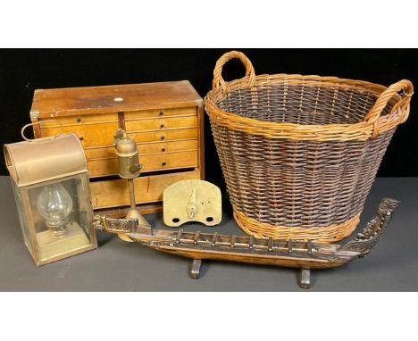 A Dutch brass oil lamp; a Seahorse brass oil lantern; a heavy brass gauge, possibly railway or shipping; a tool chest; a log 