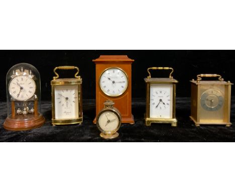 A Bayard eight day brass carriage clock, white dial, Roman numerals, made in France, 14.5cm over swing handle; a Knight Gibbi
