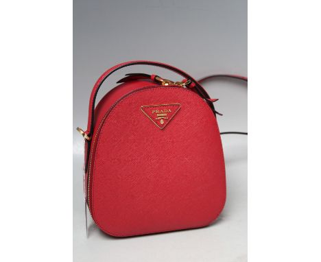 Sold at Auction: Prada Milano Basket Weave Clutch Bag