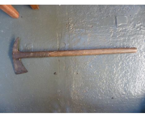 An early 20th century case iron and wood pick axe, 59cm