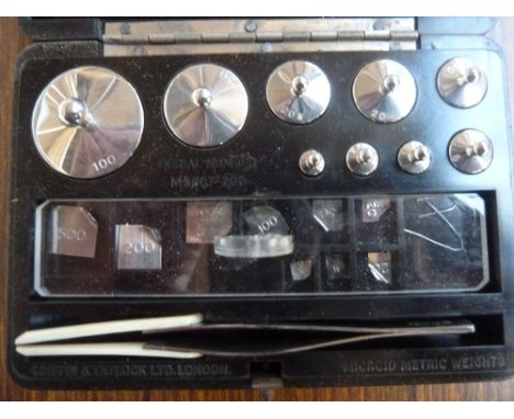 A Griffin & Tatlock Ltd set of scale weights, in its box
