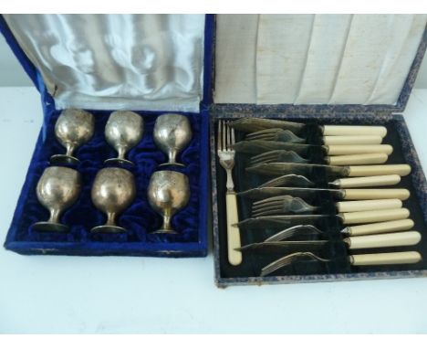 A cased set of six silver plated miniature cups, with a cased set of fish knife and forks