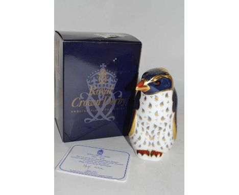 Boxed Royal Crown Derby paperweight of a rock hopper penguin