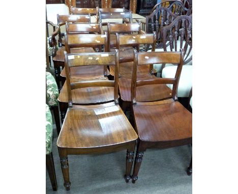A harlequin set of late Georgian mahogany dining chairs comprising six standard chairs and four carvers of slightly differing