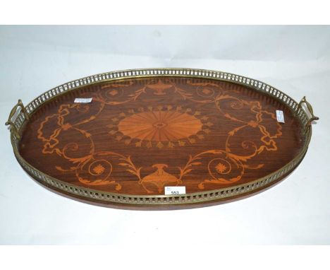 An Edwardian rosewood and brass galleried serving tray in the Sheraton Revival style, the centre inlaid with urn and floral s