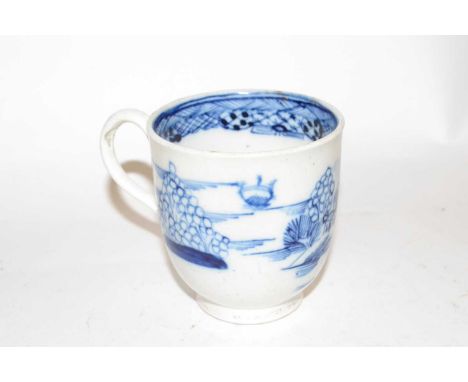 A Caughley cup with blue and white castle design, label to base for the Whatney Collection