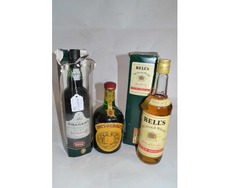 John O'Groats Scots Liqueur Whisky 75cl, Bell's Old Scotch Whisky 70cl in presentation box, and Graham's Port 1994 70cl in pr