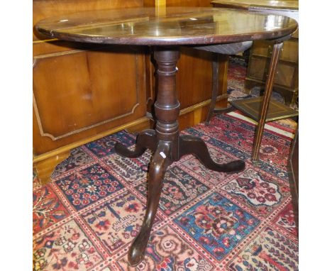 A 19th Century mahogany circular occasional table, the central turned pedestal to tripod base and spade feet