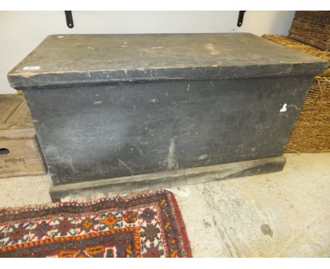A collection of pine trunks, together with a Moussec wine crate, various tools, etc