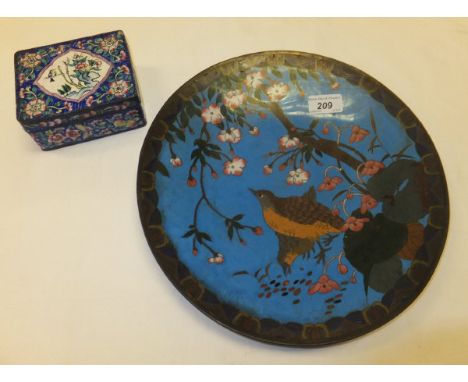 A cloisonné dish depicting a pair of birds within prunus decorated landscape and an enamel decorated box, the blue ground dec