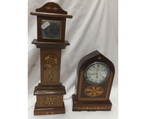 A mahogany and inlaid lancet cased mantel clock, the dial inscribed "Jaeger Paris 8 Jours", together with a Kienzle miniature