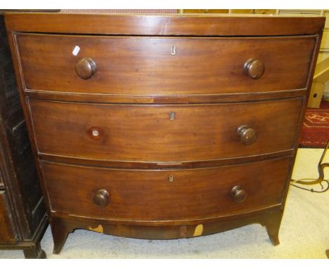 A 19th Century mahogany bow fronted chest of three long graduated drawers on splayed bracket feet