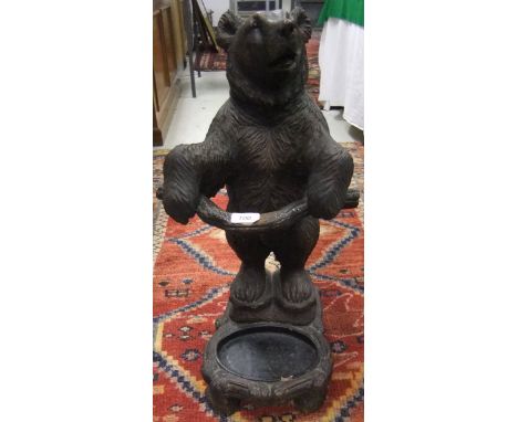 A resin figure of a bear, in the Black Forest manner, formed as a stick stand CONDITION REPORTS A significant chunk missing f