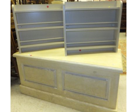 A modern cream painted blanket box / trunk and a pair of cream display shelves