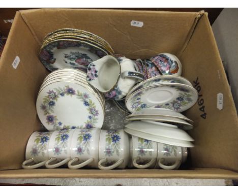 A box containing a Paragon "Cherwell" part coffee set and an Edwardian transfer decorated Cambridge part tea set, together wi