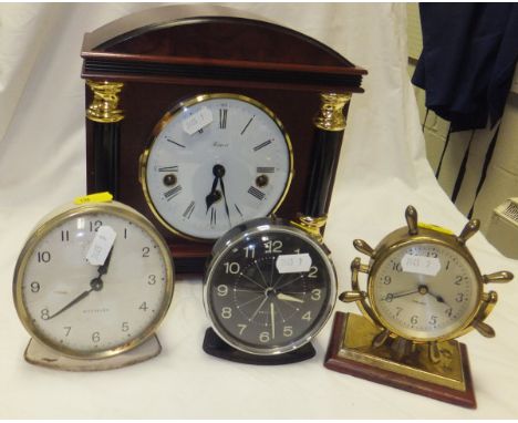 A collection of various clocks to include two Westclox alarm clocks, a Chelsea clock in the form of a ship's wheel and a maho