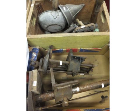 A box containing two bench mounted vices, one inscribed "Parkinson's Perfect Vice 15", the other "No 52 Record RD664709", tog