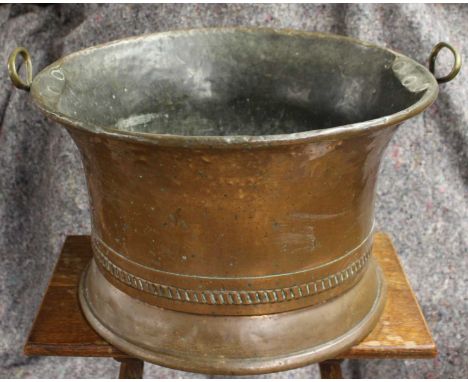 Copper planter/plant pot. Brass handles. Height 31cm, diameter 49cm.