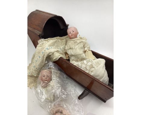 Antique &nbsp;bisque head Baby dolls Gebruder Heubach Intaglio eye baby dolls c 10&rdquo; long. One of the dolls requires str