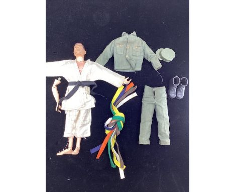Palitoy action Man soldier 1960s and uniforms ; includes a painted eye action man 1960s with a broken detached lower arm on t