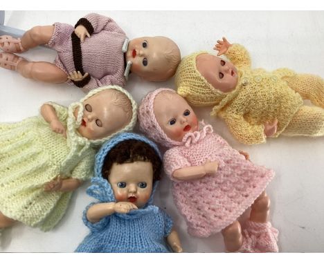 Rosebud &nbsp;Vintage 1950s Hard plastic good Thumb Suck baby 6&rdquo; dolls all dressed together with a selection of Knitted