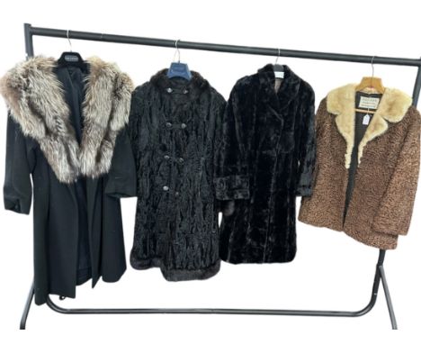 A vintage black wool coat with large fox fur collar, a double breasted lamb fur coat with fur trim, a moleskin coat and a che