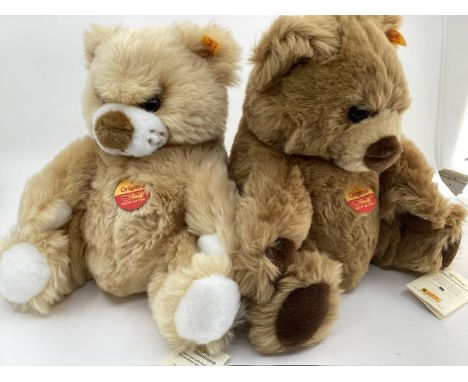 Steiff Plush pair of Original Teddy bears to include a pale gold 660696 24cm seated teddy bear toy and a 660177 dark gold sea