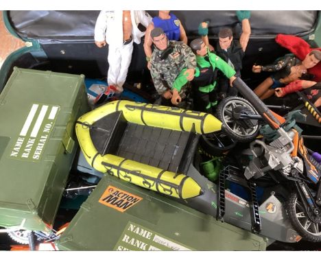 Action Man 10+ figures and a very large collection of vehicles motorbikes canoes and 2 green equipment boxes with many access