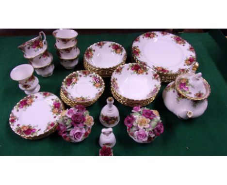A Royal Albert Old Country roses tea and part dinner service for six, three posy vases and two table bells