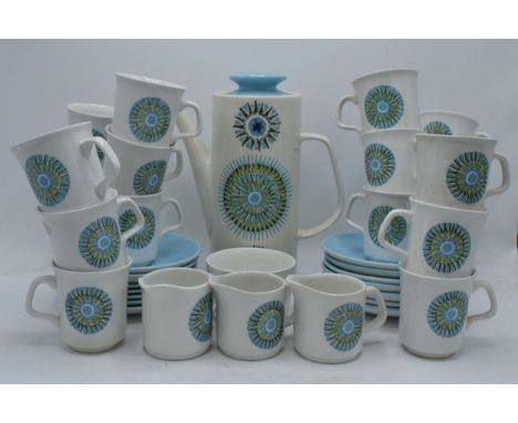 A vintage Mid Century J G Meakin coffee set in the Aztec design to include a coffee pot, 3 milk jugs, a sugar pot, 18 cups an