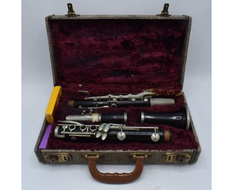 A cased Besson of London clarinet in a fitted case. Untested. May require some attention. 