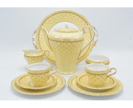 Aynsley coffee set in a yellow and gold design to consist of a coffee pot, milk and sugar pot, 5 coffee cups, 6 saucers and 6