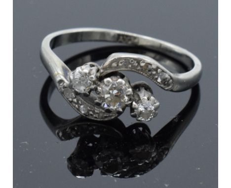 Platinum and diamond set ring. 2.4 grams. Size K. 