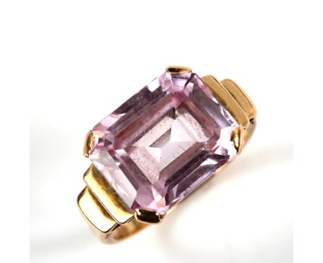 An unmarked gold pink kunzite dress ring, set with emerald step-cut kunzite, setting height 10.4mm, size J, 5.8gNo damage or 