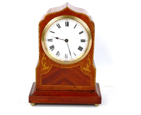 An early 20th century satinwood-inlaid mahogany shaped mantel clock, by Buren, white enamel dial with Roman numeral hour mark