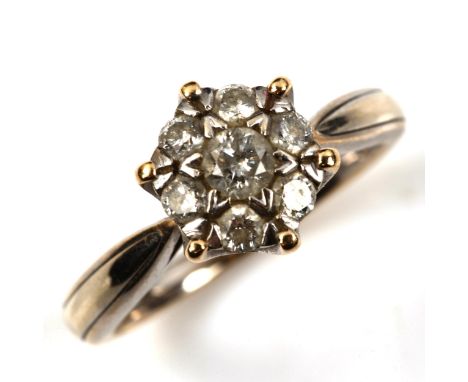 A modern 9ct white gold diamond cluster ring, set with modern round brilliant-cut diamonds, total diamond content approx 0.5c